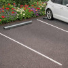 Butée de parking droite diamètre 76 mm galvanisé dans un parking