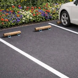 Butée de stationnement petit modèle sur un parking