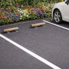 Butée de stationnement petit modèle sur un parking